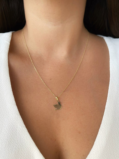 Dije Paloma 18k